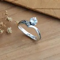 Blue topaz solitaire ring, 'Queen Crown' - Blue Topaz Silver Solitaire Ring with Darkened Accents