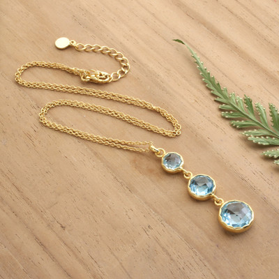 Gold-plated blue topaz pendant necklace, 'Soothing Glamour' - Gold-Plated Pendant Necklace with 3 Round Blue Topaz Stones