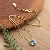 Gold-plated blue topaz pendant necklace, 'Azure Moon' - Gold-Plated Pendant Necklace with 2.5-Carat Blue Topaz Gem
