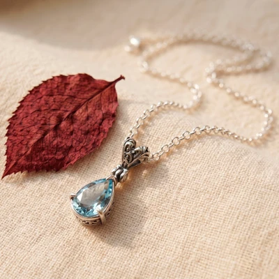 Blue topaz pendant necklace, 'Sea Call' - Balinese-Inspired 6-Carat Pear Blue Topaz Pendant Necklace