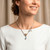 Gold-accented blue topaz pendant necklace, 'Sun and Ice' - Gold-Accented Blue Topaz Pendant Necklace with Popcorn Chain (image 2d) thumbail