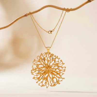 Gold-plated blue topaz pendant necklace, 'Loyal Nucleus' - High-Polished 18k Gold-Plated Blue Topaz Pendant Necklace