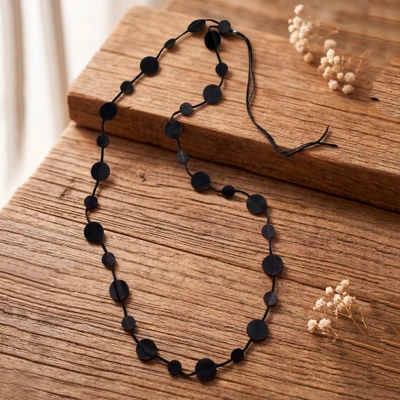 Leather station necklace, 'Moonlit Black' - Adjustable 100% Leather Long Station Necklace in Black Hues