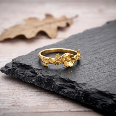 Gold-plated band ring, 'Shiny Blossoming Crown' - 18k Gold-Plated Band Ring with Floral and Leaf Detailing