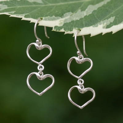 Sterling silver dangle earrings, 'Twin Love' - Romantic Sterling Silver Dangle Earrings with Heart Pendants