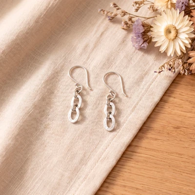 Sterling silver dangle earrings, 'Textured Chains' - Hammered Silver Dangle Earrings with Interlinked Chain Theme