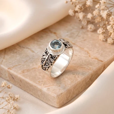 Blue topaz single stone ring, 'Loyal Dragonfly' - Faceted Blue Topaz and Dragonfly Band Single Stone Ring