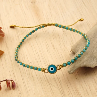 Gold-accented apatite pendant bracelet, 'Manifesting Eye' - Adjustable Turkish Eye Pendant Bracelet with Apatite Beads