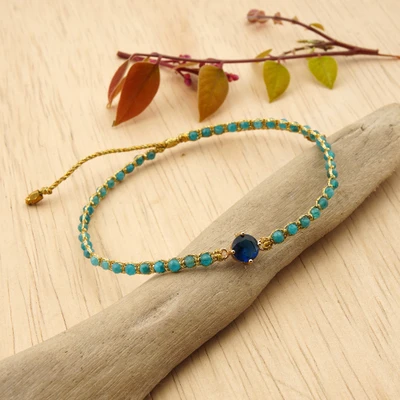 Gold-accented apatite and recycled glass beaded macrame pendant bracelet, 'Sea Hues' - Gold-Accented Apatite Recycled Glass Bracelet in Blue Shades