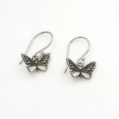 Sterling silver dangle earrings, 'Fluttering Life' - Whimsical Silver Dangle Earrings with Butterfly Motif