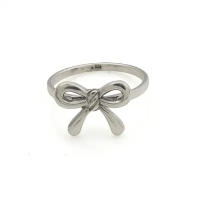 Sterling silver band ring, 'Radiant Ribbon' - Sterling Silver Band Ring with Ribbon Motif Crafted in Bali