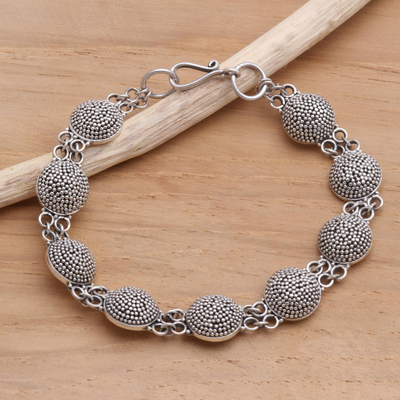 Sterling silver link bracelet, Buttons