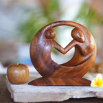 Wood sculpture, 'World Peace' - Hand Carved Suar Wood Sculpture