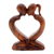 Wood statuette, 'Kiss Me Quick!' - Handcrafted Indonesian Romantic Wood Sculpture thumbail