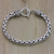 Men's sterling silver braided bracelet, 'Passion' - Men's Sterling Silver Chain Bracelet (image 2) thumbail