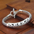 Sterling silver pendant bracelet, 'Mystic Symbols' - Artisanmade Sterling Silver Braided Bracelet thumbail