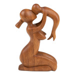 Wood sculpture, 'Mother's Love' - Suar Wood Family Sculpture