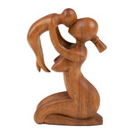 Wood sculpture, 'Mother's Love' - Suar Wood Family Sculpture