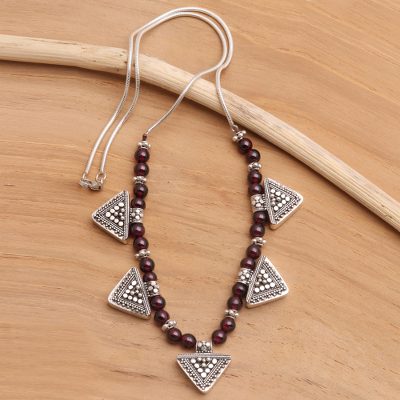 Garnet pendant necklace, 'Shields of Sun' - Garnet Sterling Silver Pendant Necklace