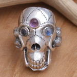 Men's rainbow moonstone and amethyst ring, 'Immortal' - Men's Indonesian Silver and Amethyst Skull Ring