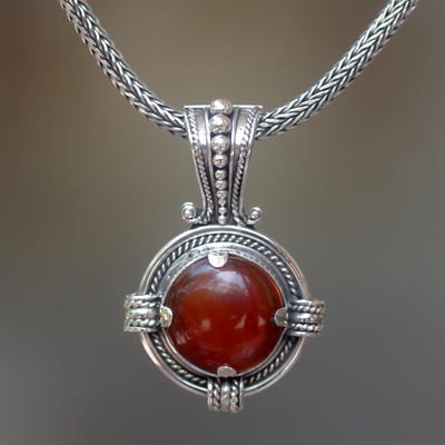 Carnelian pendant necklace, 'Russet Oracle' - Sterling Silver Carnelian Pendant Necklace