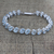 Topaz tennis bracelet, 'Sparkling Blue River' - Sterling Silver Link Blue Topaz Bracelet from India