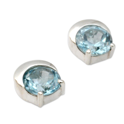 Blue topaz stud earrings, 'Twinkling Moons' - Sterling Silver and Blue Topaz Stud Earrings from India
