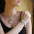 Moonstone link bracelet, 'Floral Legends' - Artisan Crafted Moonstone Sterling Silver Bracelet