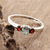 Garnet and blue topaz 3-stone ring, 'Passionate Embrace' - Blue Topaz and Garnet Ring thumbail
