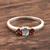 Garnet and blue topaz 3-stone ring, 'Passionate Embrace' - Blue Topaz and Garnet Ring (image 2b) thumbail