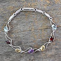 Garnet and blue topaz link bracelet, 'Colors of Life'