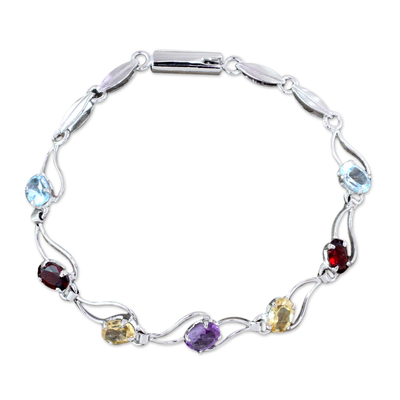 Garnet and blue topaz link bracelet