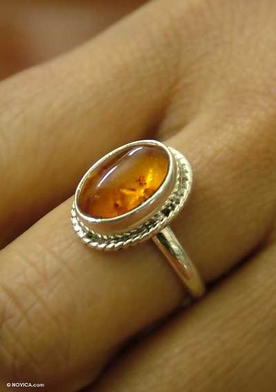 Amber solitaire ring,