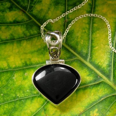 Onyx pendant necklace, 'Enigma' - Fair Trade Sterling Silver Onyx Pendant Necklace
