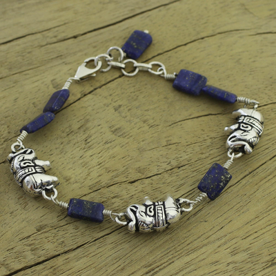 Lapis lazuli charm bracelet, 'Midnight Elephants' - India Elephant Jewelry Lapis and Silver Bracelet