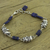 Lapis lazuli charm bracelet, 'Midnight Elephants' - India Elephant jewellery Lapis and Silver Bracelet thumbail