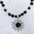 Pearl and onyx flower necklace, 'Facets' - Artisan Crafted Sterling Silver Pearl and Onyx Necklace thumbail