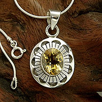 Citrine pendant necklace, 'Sun Halo' - Multifaceted Citrine and Sterling Silver Pendant Necklace