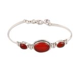 Carnelian pendant bracelet, 'Mystique' - Sterling Silver and Carnelian Modern Bracelet Jewelry