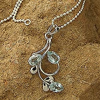 Blue topaz pendant necklace, 'Ethereal Dew' - Unique Sterling Silver and Blue Topaz Necklace