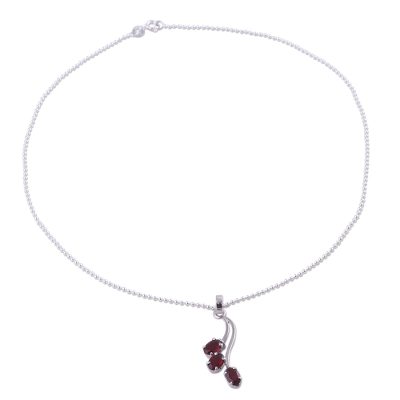 Garnet pendant necklace, 'Shooting Stars' - Hand Made Sterling Silver and Garnet Necklace