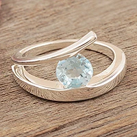 Blue topaz solitaire ring, 'Dazzling Love'