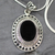 Onyx pendant necklace, 'Tribal Medallion' - Handmade Sterling Silver and Onyx Necklace from India thumbail