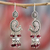 Garnet chandelier earrings, 'Paisley Peacock' - Sterling Silver and Garnet Chandelier Earrings from India