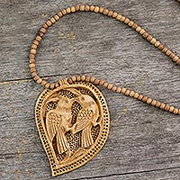 Collar con colgante de madera, 'Love Takes Wing' - Collar de madera tallada a mano de la colección de joyería India