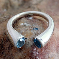 Blue topaz wrap ring, 'Face to Face' - Blue Topaz Ring 2 Cts Sterling Silver from India