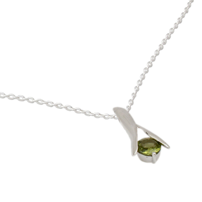 Peridot pendant necklace, 'Silver Flare' - Fair Trade Modern Sterling Silver and Peridot Necklace