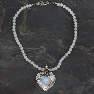 Rainbow moonstone and garnet pendant necklace, 'Moonlight Passion' - Sterling Silver and Rainbow Moonstone Necklace