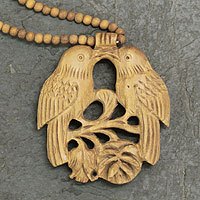 Wood pendant necklace, 'Courtship' - Wood Beaded Bird Necklace from India