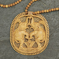Wood pendant necklace, 'Playful Elephants' - India Jali Jewelry Hand Crafted Beaded Necklace